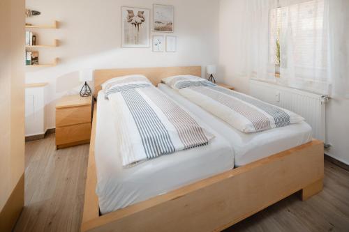 Postel nebo postele na pokoji v ubytování De Gode Stuuv - mit Sauna