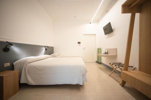 Hotel Leon D'Oroにあるベッド