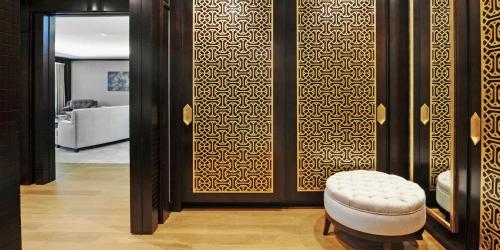 a room with a door with a stool in front of it at Crowne Plaza Bursa Convention Center & Thermal Spa by IHG in Bursa