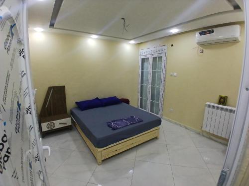 Кровать или кровати в номере Duo chambre