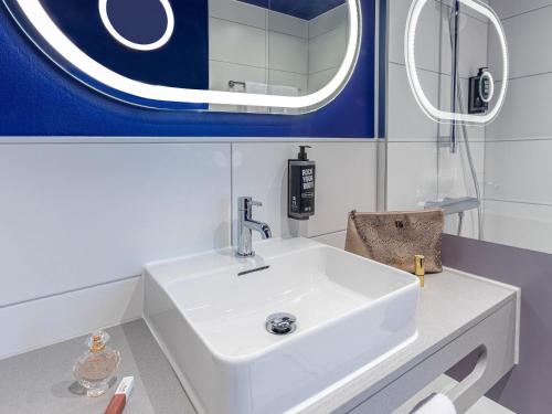 Un baño de ibis Styles Muenchen Perlach