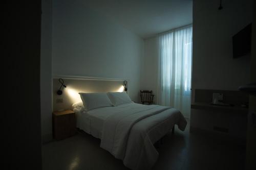 Hotel Leon D'Oroにあるベッド