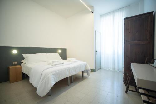 Hotel Leon D'Oroにあるベッド