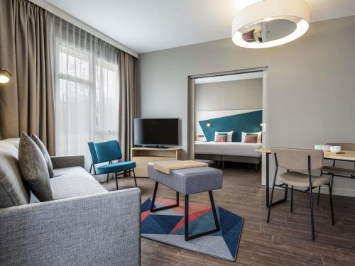 Televisyen dan/atau pusat hiburan di Aparthotel Adagio Glasgow Central