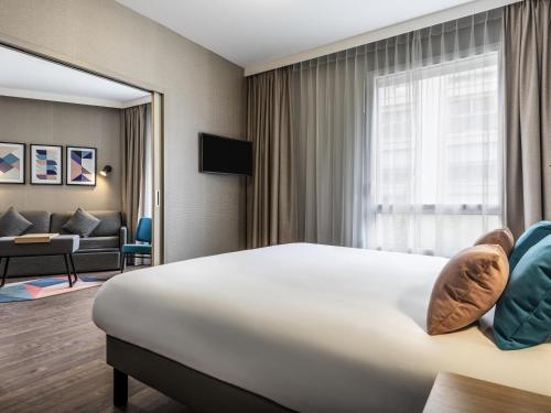Televisyen dan/atau pusat hiburan di Aparthotel Adagio Glasgow Central