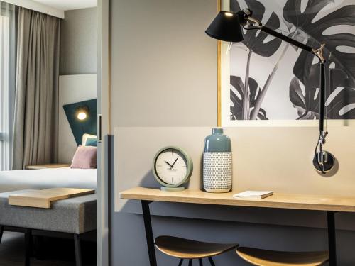Katil atau katil-katil dalam bilik di Aparthotel Adagio Glasgow Central