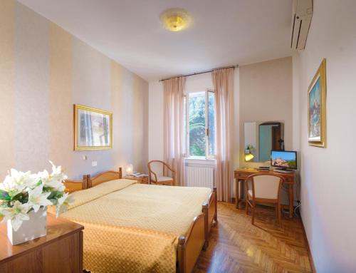 Postel nebo postele na pokoji v ubytování San Gabriele