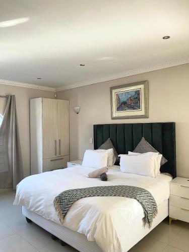 Ένα ή περισσότερα κρεβάτια σε δωμάτιο στο Nala Guest House
