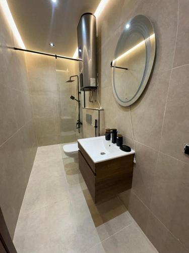 a bathroom with a sink and a mirror at STUDIO HIGH LuX 01 in Tangier