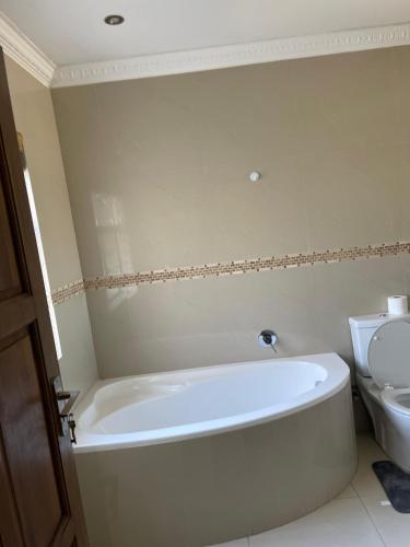 Ένα μπάνιο στο Nala Guest House