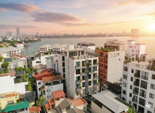 an aerial view of a city with buildings at Margaery Boutique Apartment & Skyon9 Rooftop Bar in Hanoi