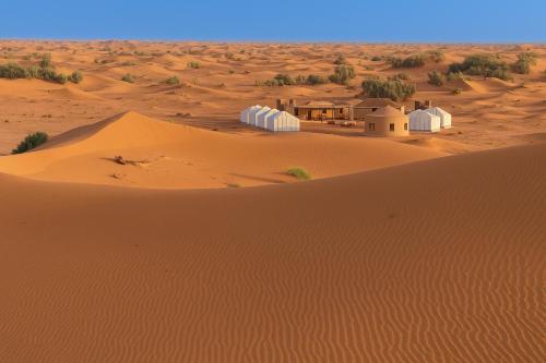 a desert village in the middle of the desert at Bivouac Luna in Mhamid