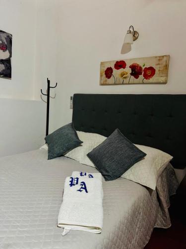 Apartamento Colonial Puerta Azulにあるベッド