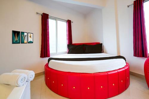 Ένα ή περισσότερα κρεβάτια σε δωμάτιο στο FabHotel Seven Elite