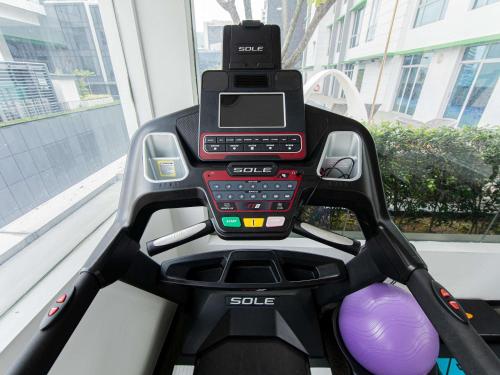 a machine with a cell phone on top of it at ibis Styles Singapore Albert in Singapore