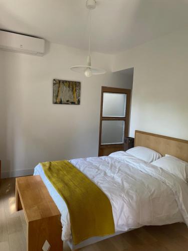 Postel nebo postele na pokoji v ubytování Gîte de l'atelier in Sorèze