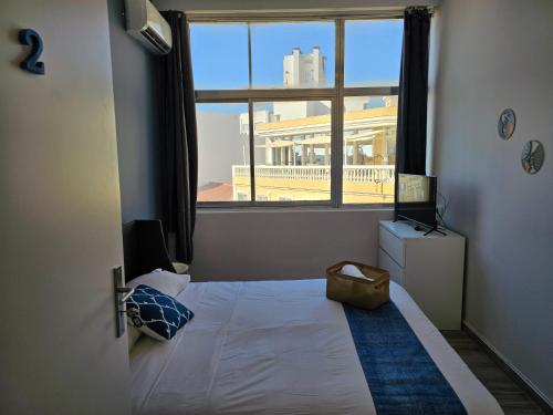 Un pat sau paturi într-o cameră la Blife Spanya - private rooms at Santantonya 3rd floor
