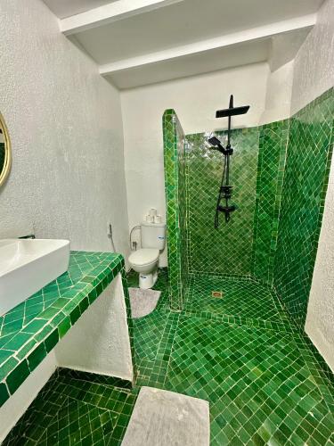 Un baño de Riad Green Vines