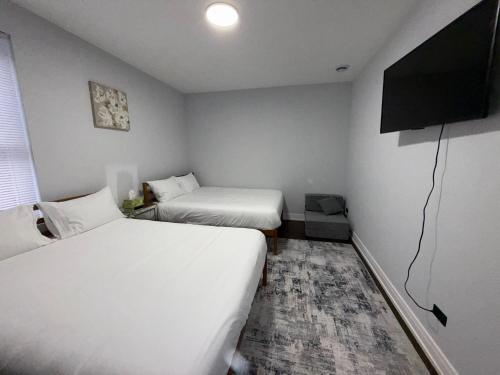 Ένα ή περισσότερα κρεβάτια σε δωμάτιο στο Feel at home