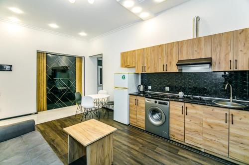 O bucătărie sau chicinetă la BSC Apartment