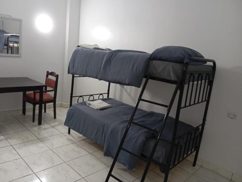 Postel nebo postele na pokoji v ubytování Abeer Guest House