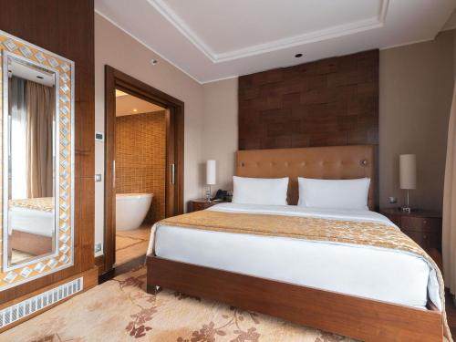 Katil atau katil-katil dalam bilik di Rixos Borovoe