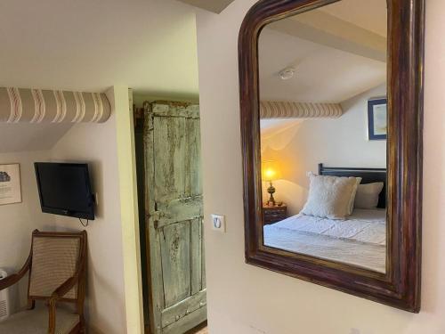 Postel nebo postele na pokoji v ubytování La petite hostellerie