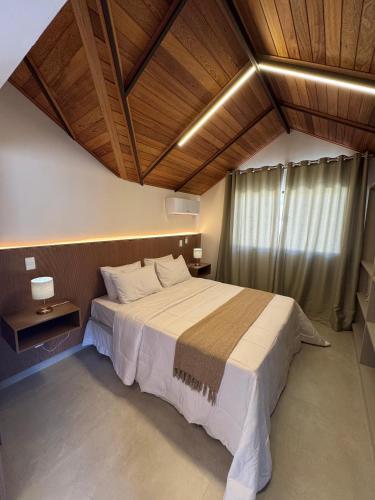 Llit o llits en una habitació de Loft Veneza