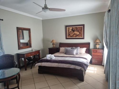 Postel nebo postele na pokoji v ubytování Skilpadvlei Cottage and Studio's