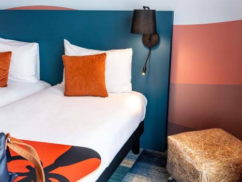 Ένα ή περισσότερα κρεβάτια σε δωμάτιο στο Ibis Styles Miramas