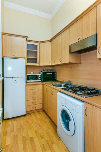 Køkken eller tekøkken på ISKCON Apartment