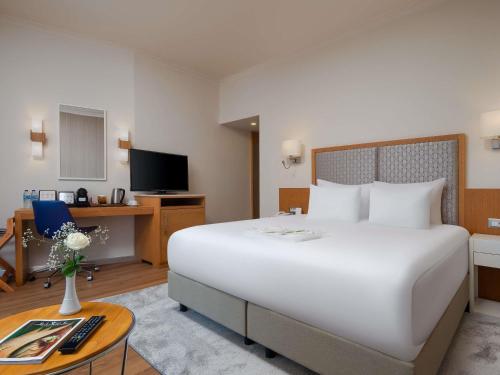 En eller flere senge i et værelse på Rixos Park Belek - The Land Of Legends Access