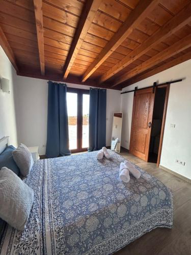 Ένα ή περισσότερα κρεβάτια σε δωμάτιο στο Casa Noroeste