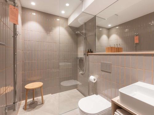 Un baño de Oru Hub Hotel Tallinn - Handwritten Collection