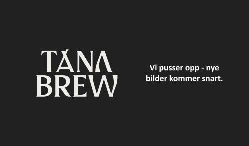 a couple of white words on a black background at Tanabrew in Tana