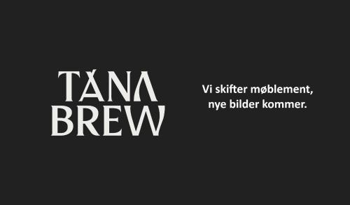 a couple of white words on a black background at Tanabrew in Tana