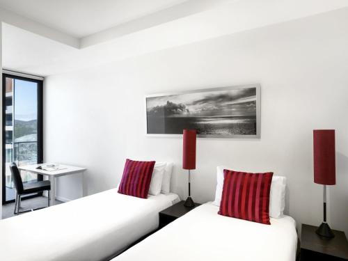 Ένα ή περισσότερα κρεβάτια σε δωμάτιο στο Peppers Gallery Hotel