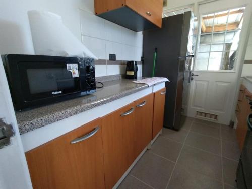 Кухня или мини-кухня в Casa cómoda y espaciosa en Puerto Montt
