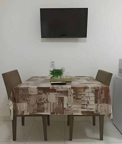 TV a/nebo společenská místnost v ubytování Temporada Cuiabana