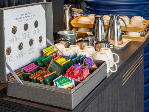 a tray filled with different types of food on a counter at Mercure Thurrock Stifford Hall in Grays Thurrock