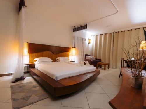 Ένα ή περισσότερα κρεβάτια σε δωμάτιο στο Mantis Soanambo Hotel And Spa