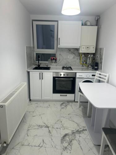 Η κουζίνα ή μικρή κουζίνα στο Fox Apartament