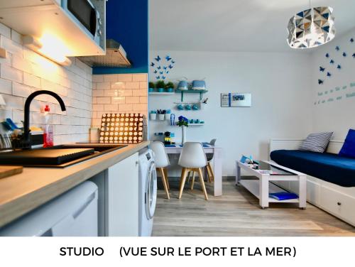 a kitchen with a sink and a living room with a couch at Appart Cosy Brest (La gare) vue mer in Brest