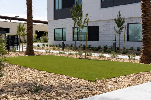 a small artificial lawn in front of a building at Element Las Vegas Airport in Las Vegas