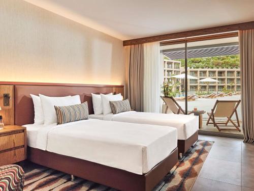 Katil atau katil-katil dalam bilik di Hyde Bodrum - Ultra All Inclusive, Adult Only