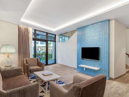 Televisyen dan/atau pusat hiburan di Rixos Premium Alamein