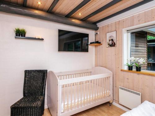 Katil atau katil-katil dalam bilik di 5 star holiday home in Fårvang