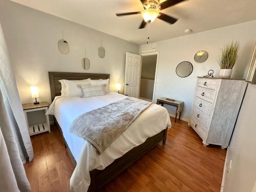 a bedroom with a large bed and a ceiling fan at Vail Vintage Vista in Vail