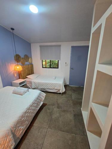 Katil atau katil-katil dalam bilik di Hotel Zelen