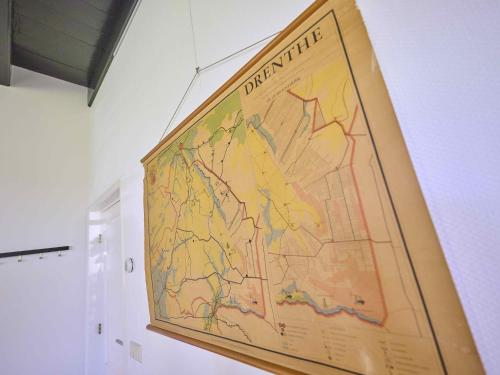a large map hanging on a wall at t Voorhuis Kolderveen in Nijeveen